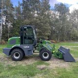 Hjullastare Skipsna T8600 i profil från höger med stor lastskopa
