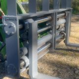 Närbild på hydraulcylindrar på pallgafflar EXTRA LARGE till lastmaskin