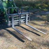 Hydrauliska pallgafflar MEDIUM med hydrauliskt ställbara gafflar på hjullastare