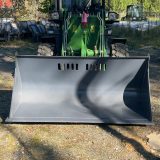 Snöskopa SLS2020 rakt framifrån på grön hjullastare